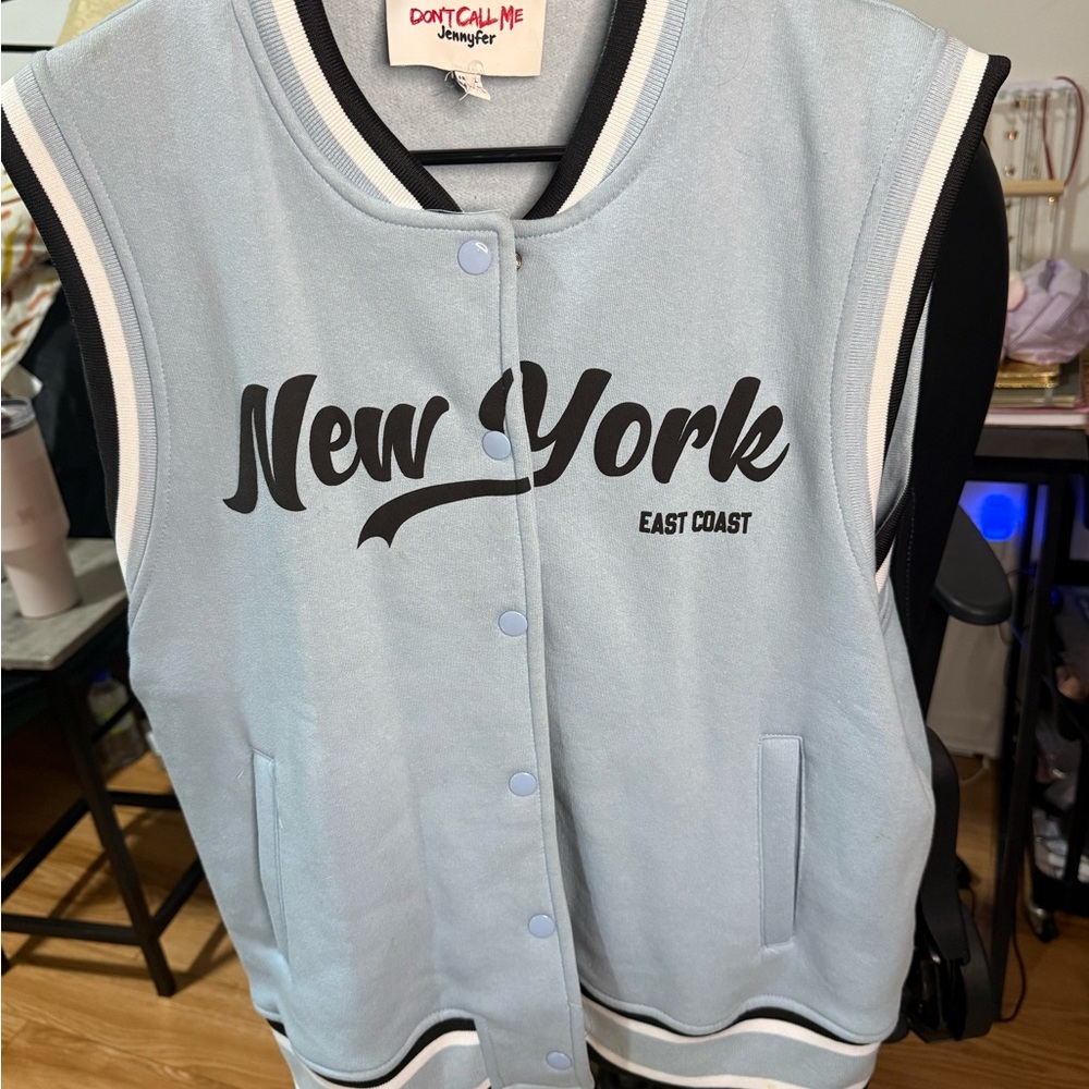 Don't Call Me Jennifer Light Blue Sleeveless Varsity Jacket - New York Print